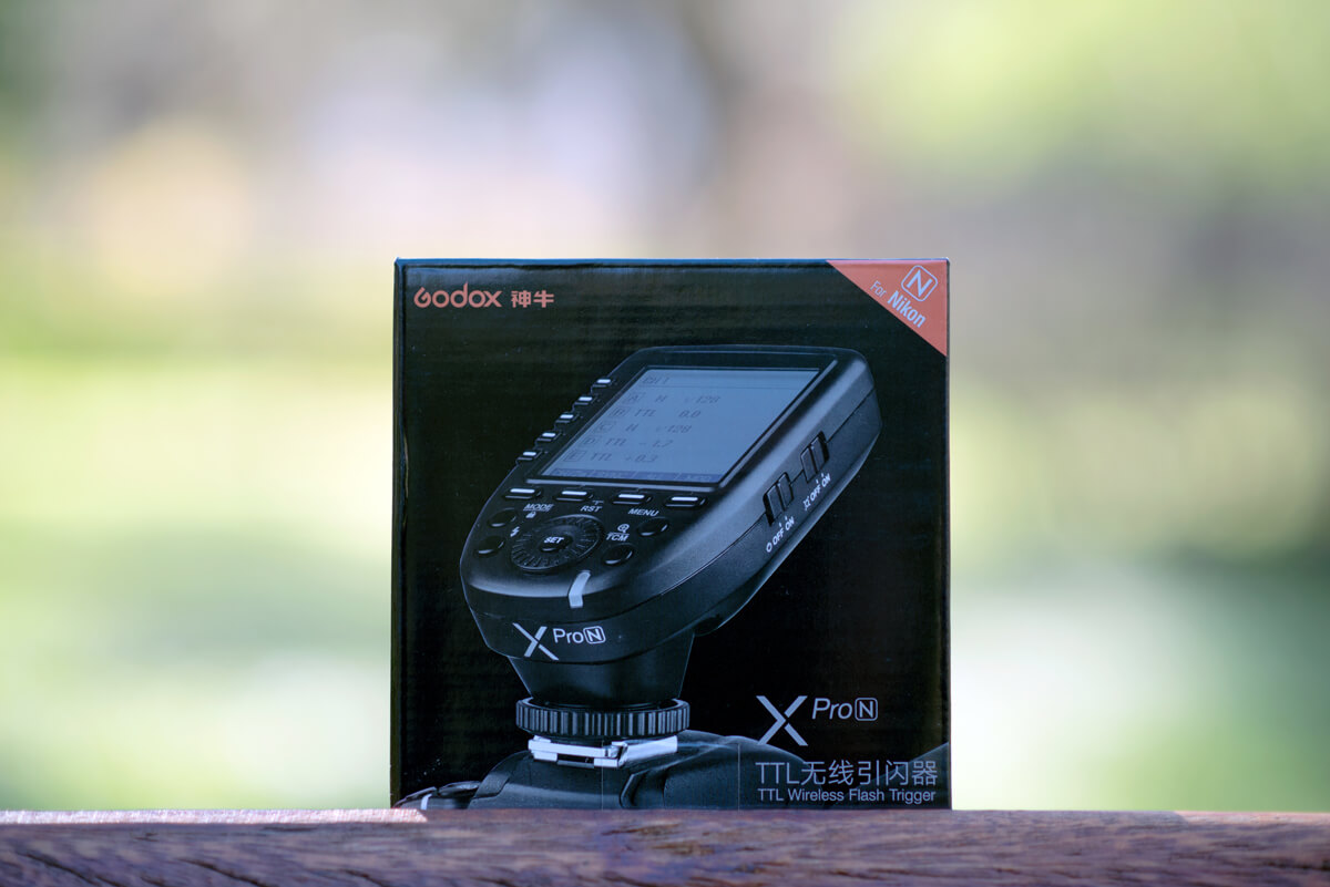 Transmisor Godox XPro TTL en su caja